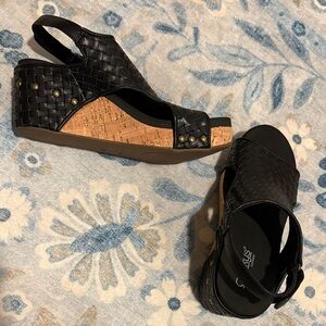 Stylish Black Woven Wedge Sandals by Corky’s Footwear.